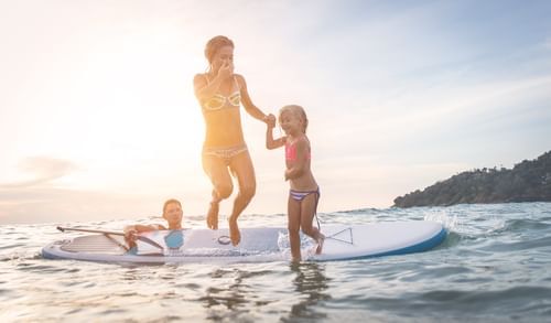 Family paddle boarding