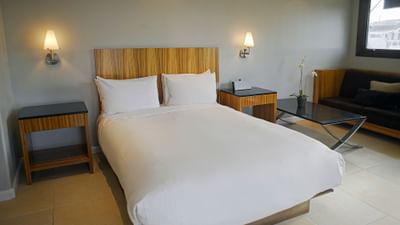 resort oceanview suite bed and couch