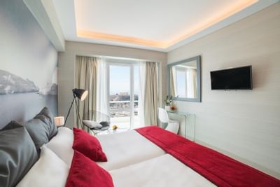 King size bed in guest room at St. George Lycabettus
