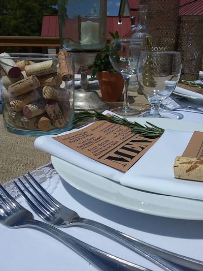 Close photo of forks and a menu