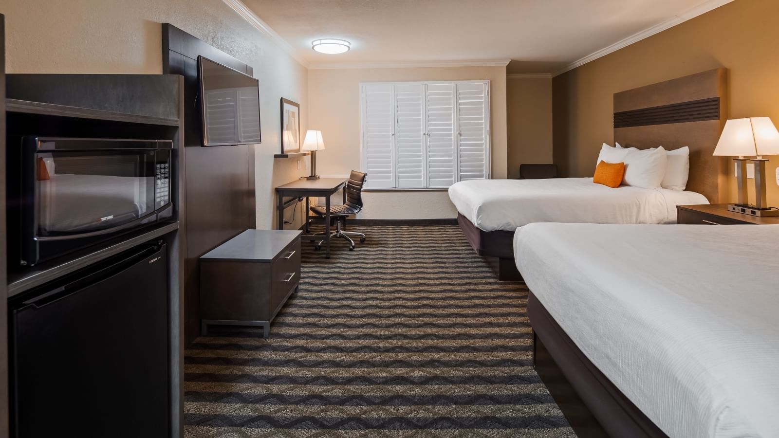two beds in a hotel room