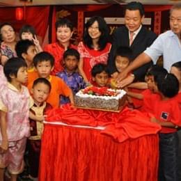 People gathered to cut a cake at The Federal Kuala Lumpur