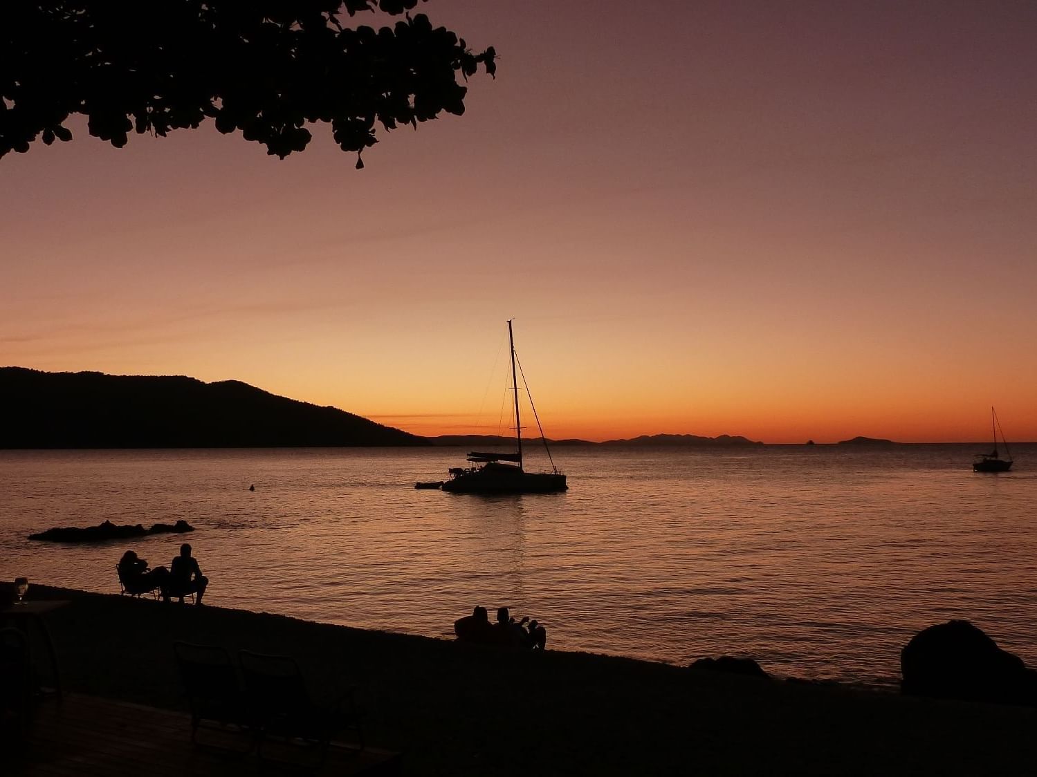 Sunset view from Lovers cove bar at Daydream Island Resort