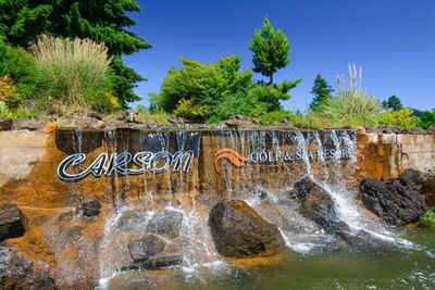 Hotel sign on a waterfall rock at Carson Hot Springs