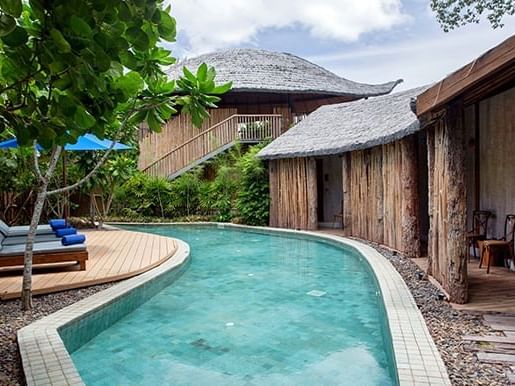 Pool with sunbeds in Family Villa at U Hotels and Resorts