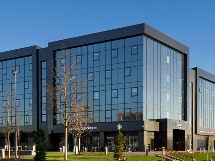 A distant exterior view of the hotel at Village Hotels