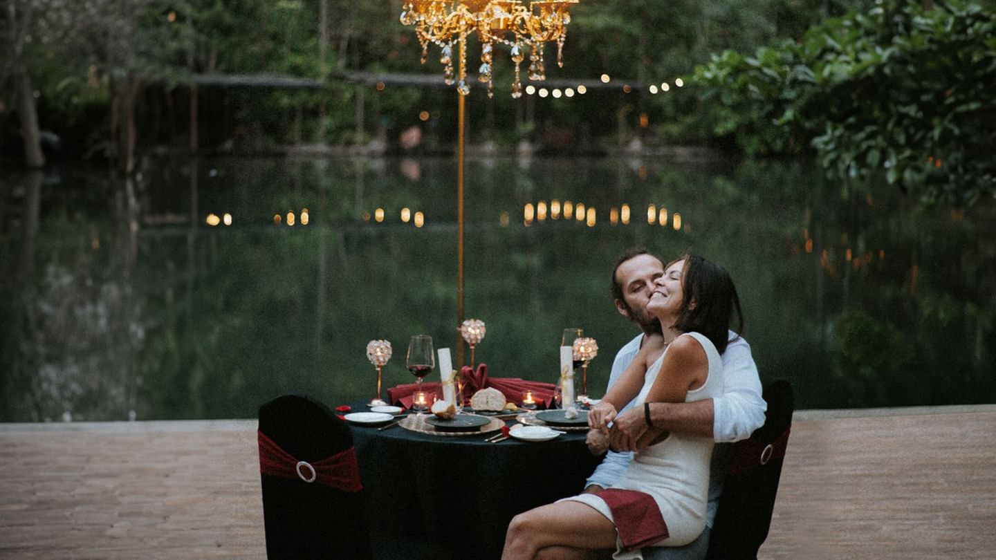 Couple enjoying dinner on the Star Deck at The Banjaran Hotsprings Retreat