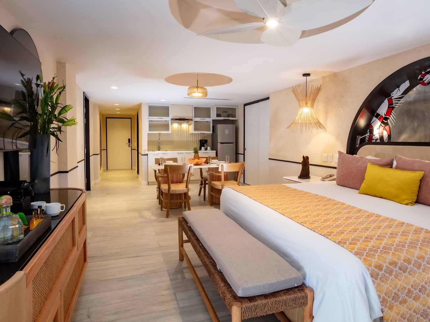 Eden Garden Suite at Almar Resort featuring a king bed, a dining area, and a kitchenette, a perfect gay hotel Puerto Vallarta