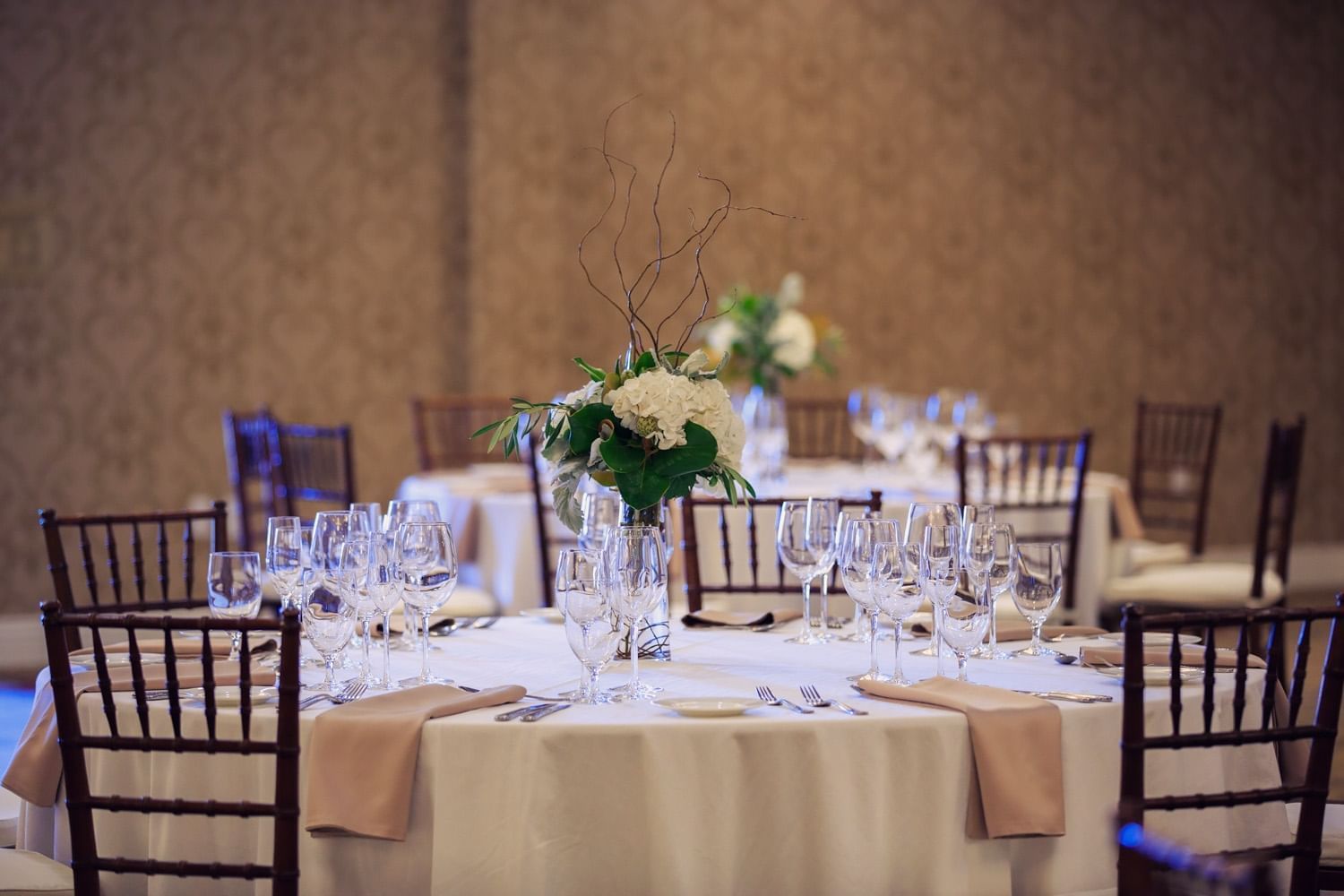 Meetings Close up of conference room round table set for dining with a fl