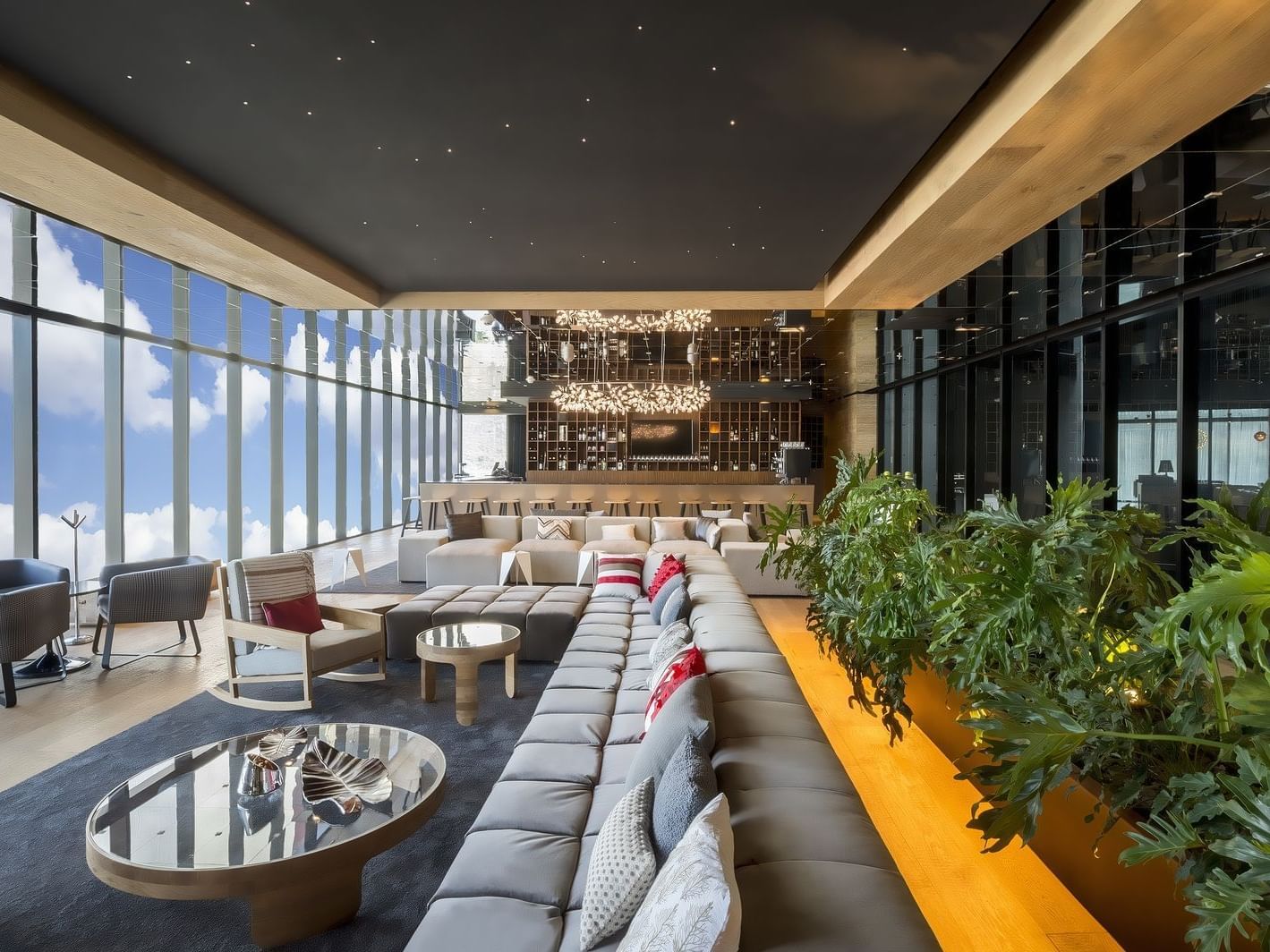 Sectional sofa in Bar Nyte seating area at La Colección Resorts