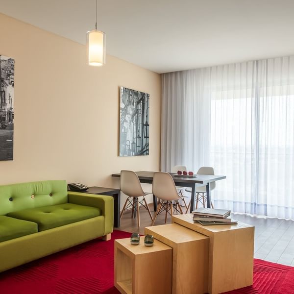 The living area of Junior Suite with lounges at Fiesta Inn
