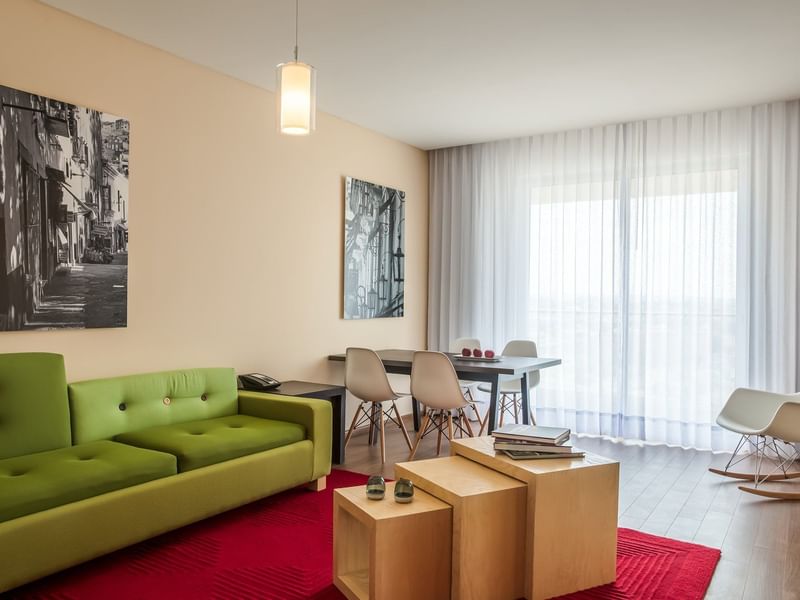 The living area of Junior Suite with lounges at Fiesta Inn