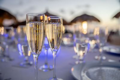 Close-up of champagne glasses on a table at Amsterdam Manor