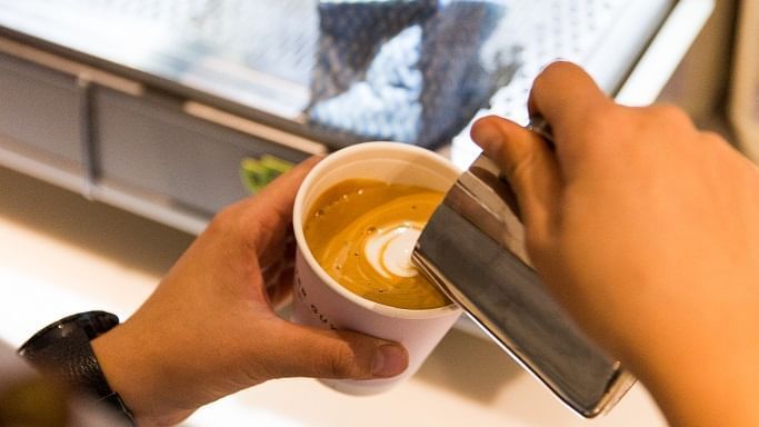 Pouring coffee in Novotel Darling Harbour