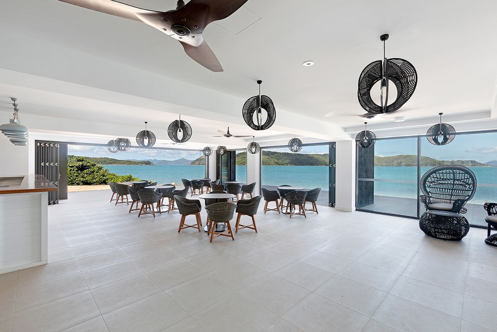 Interior of restaurant with sea views at Daydream Island Resort