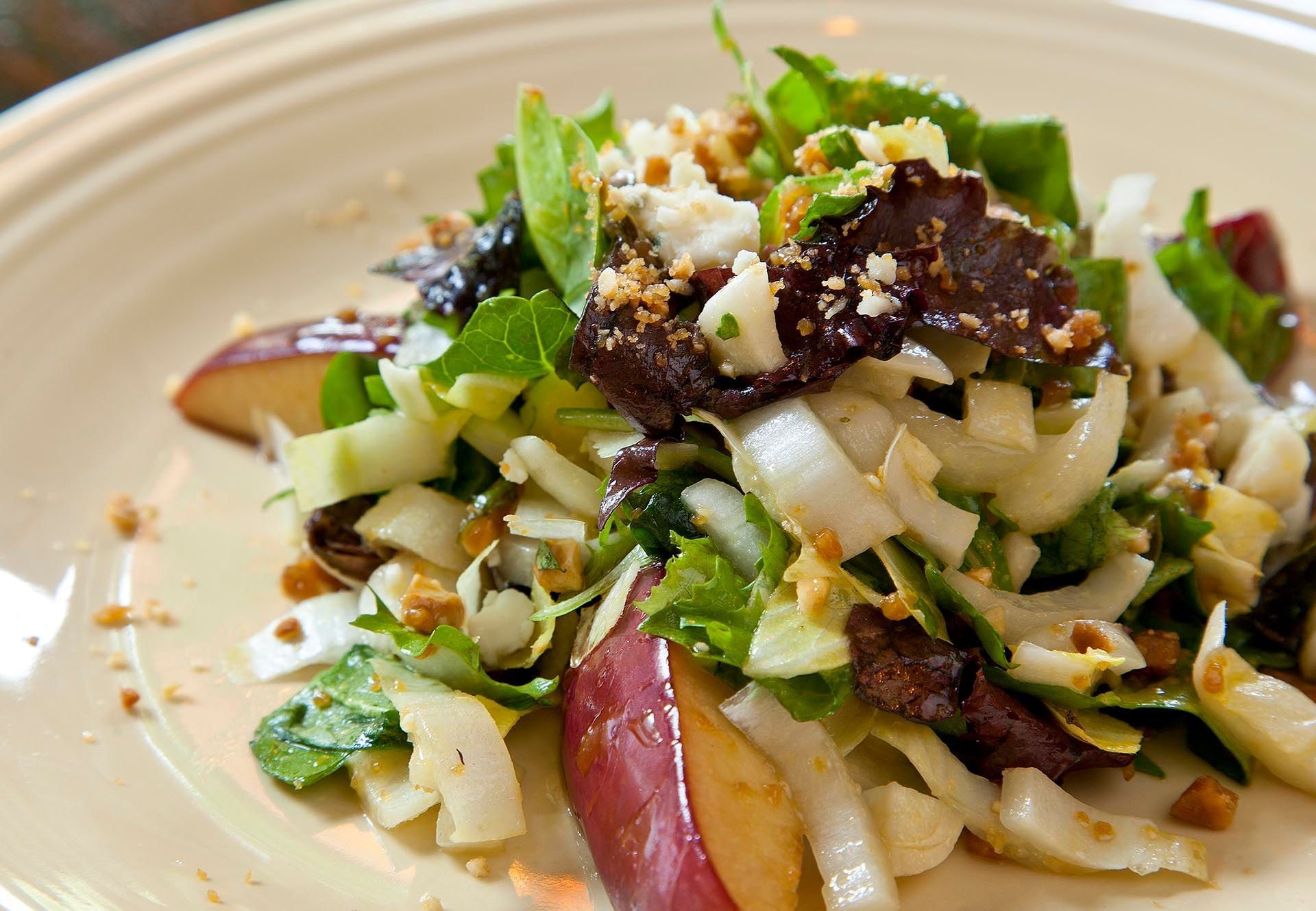 Close-up of salad served in Margaux Restaurant at Warwick Seattle