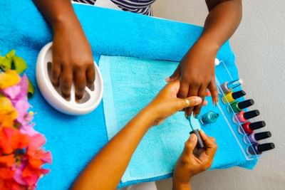 Close-up of woman receiving a manicure in the Spa at Dover Beach Hotel