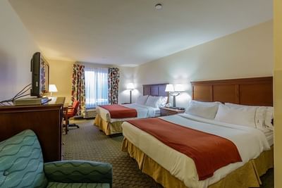 Beds in Standard Double Queen Room at Triple Play Resort Hotel