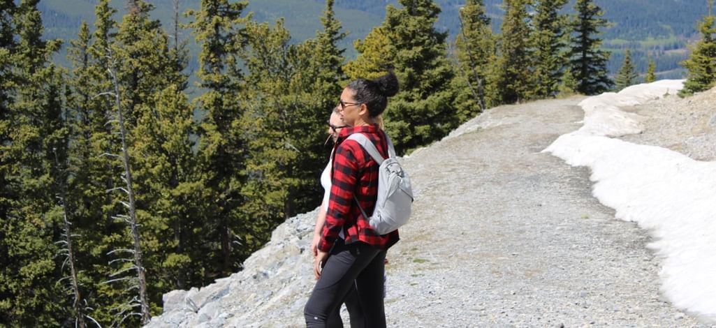 admiring the view on a hiking trail in Canmore