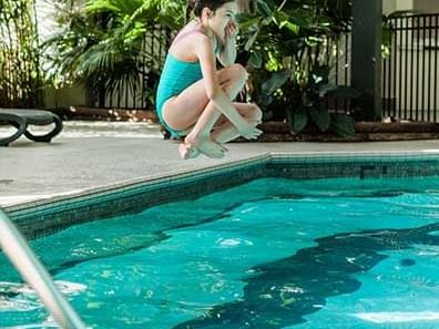 Cannon Ball into the courtyard pool