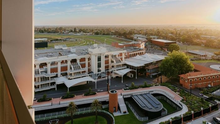 Shops with modern architecture and lush landscaping.