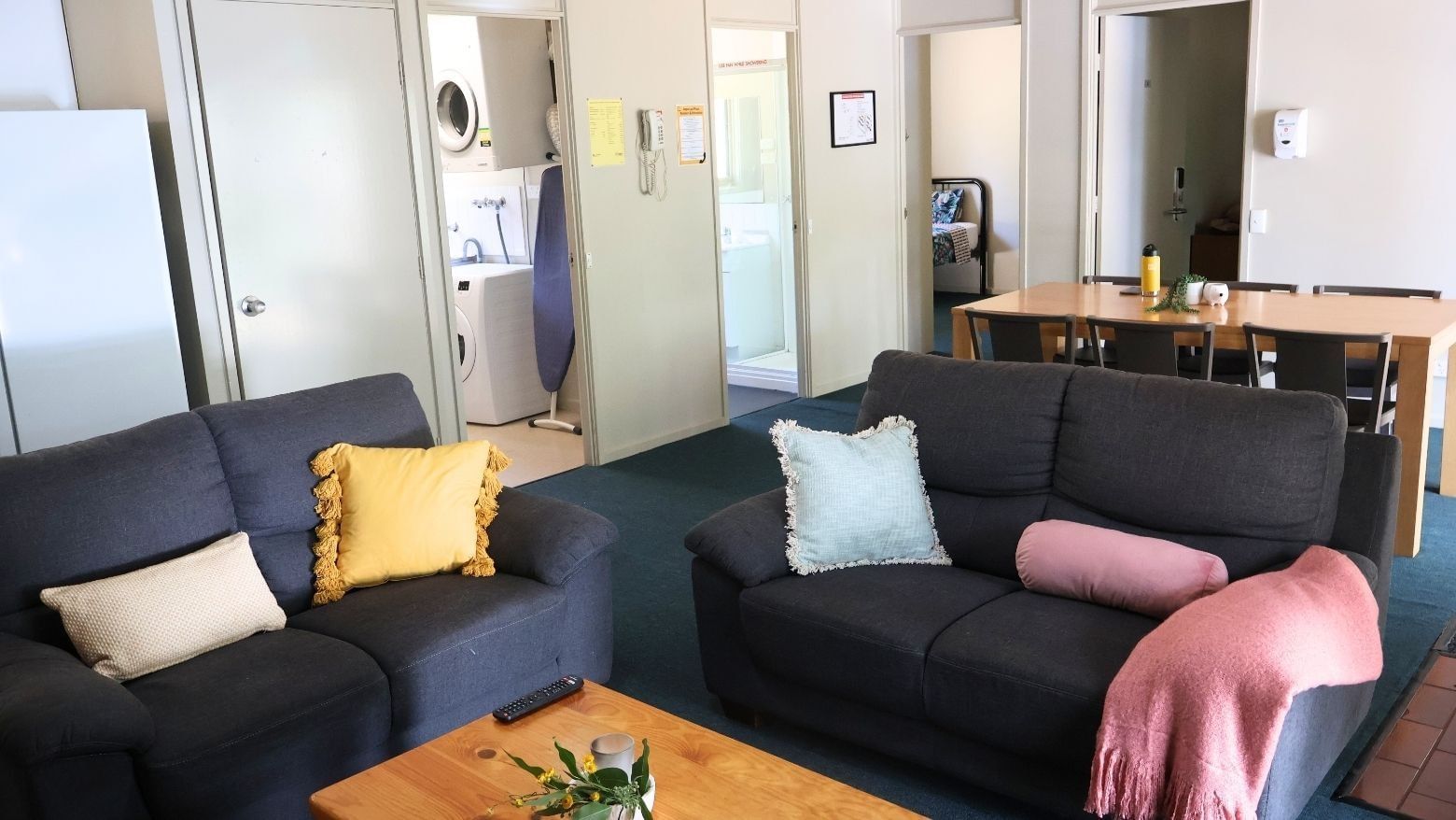 Cozy living area with two sofas and a coffee table at La Trobe University - Villas.