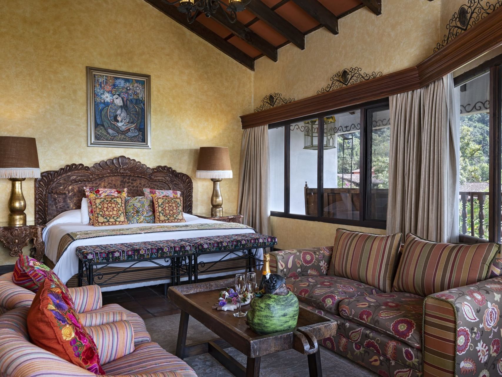 King bed & lounge area in Master Suite at Hotel Atitlan
