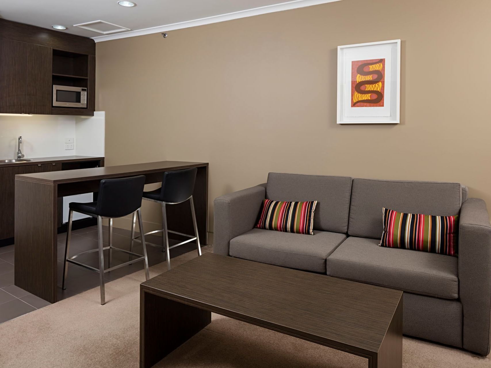 One Bedroom Apartment lounge at Grand Chancellor Townsville