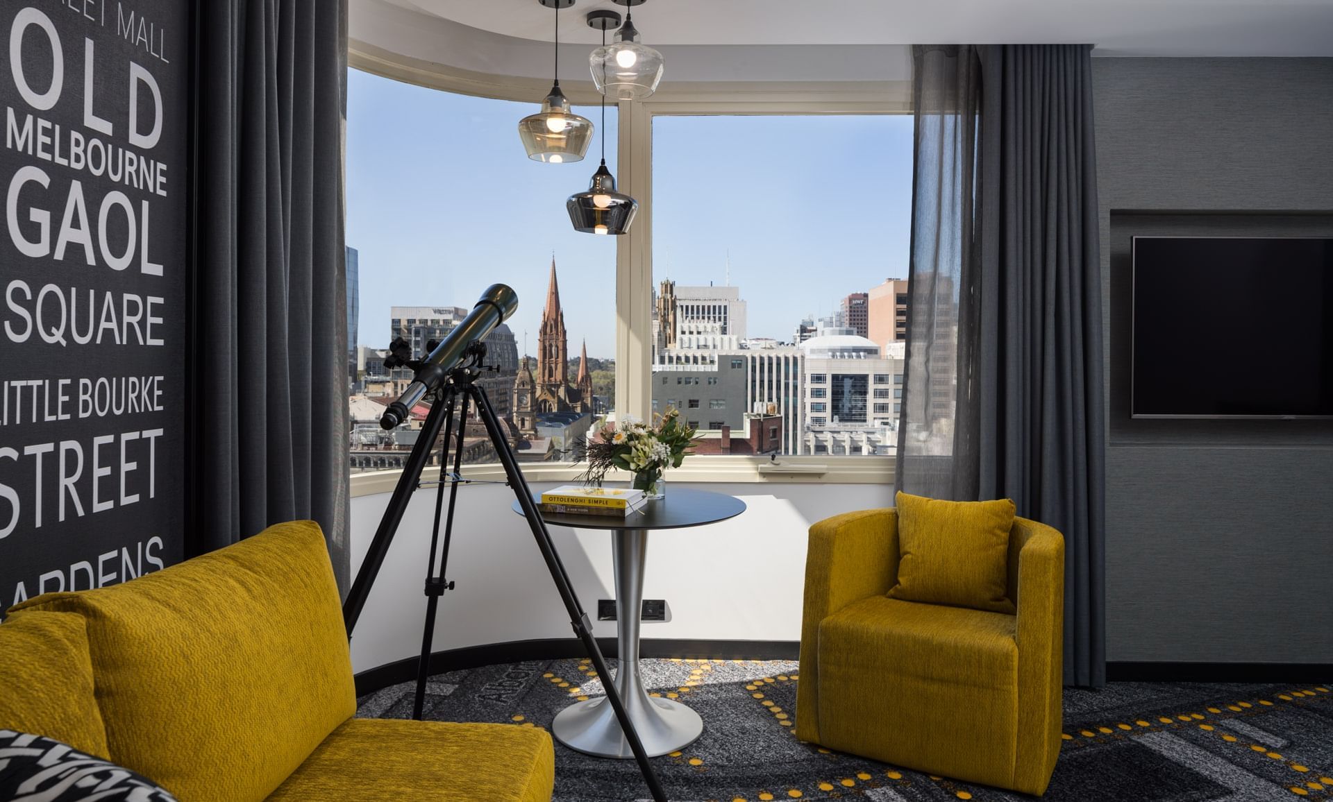 Lounge area of a room at Pullman Melbourne City Centre