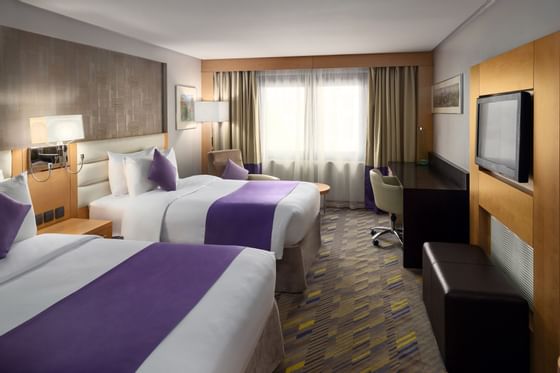 Standard rooms with twin beds & TV at Mena Red Sea Place