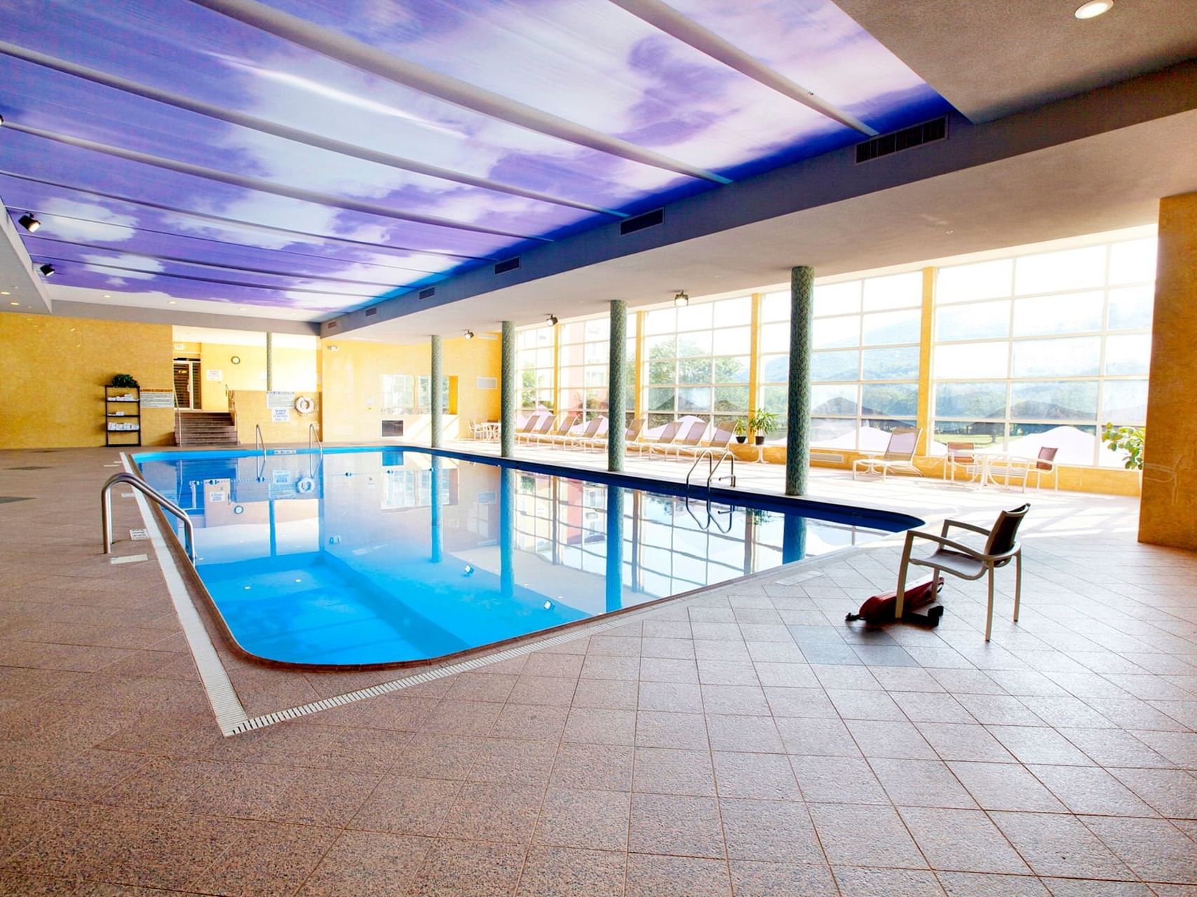 Indoor pool & lounge area at Honor’s Haven Retreat