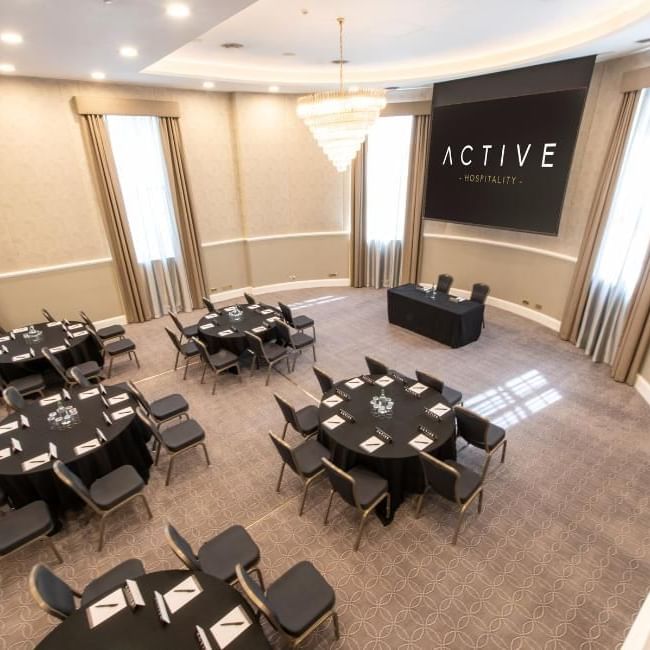 Ballroom at Villiers Hotel set up for a meeting featuring our article on 
