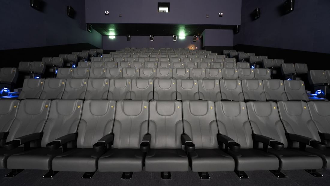 Golden Screen Cinema theater with rows of grey seats near Sunway Hotel Big Box