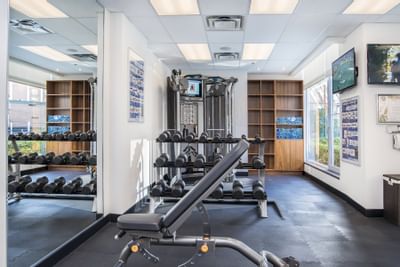 Weight sets and bench in hotel gym