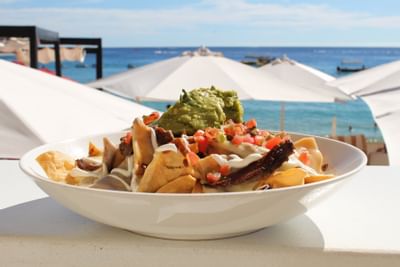 Nachos dish by the beach at Wet bar in Cabo Villas Beach Resort