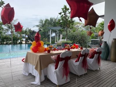 Dining table decorated with balloons at The Danna Langkawi