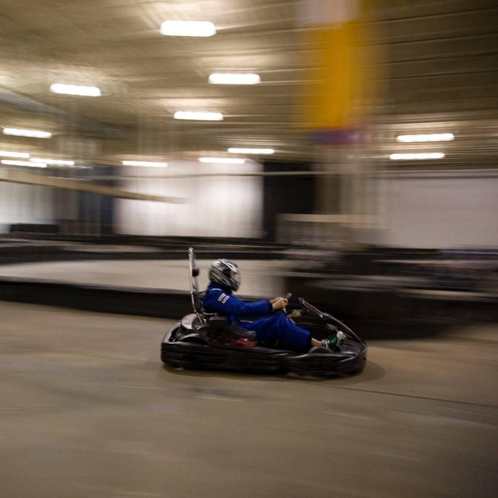 Racer driving on a track at Kart track Rosental Carinthia near Falkensteiner Hotel & Spa Carinzia