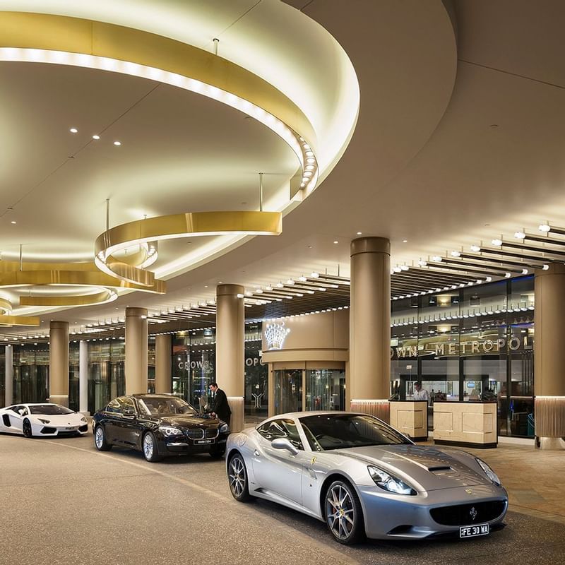 Four cars parked at the entrance of Crown Metropol Perth