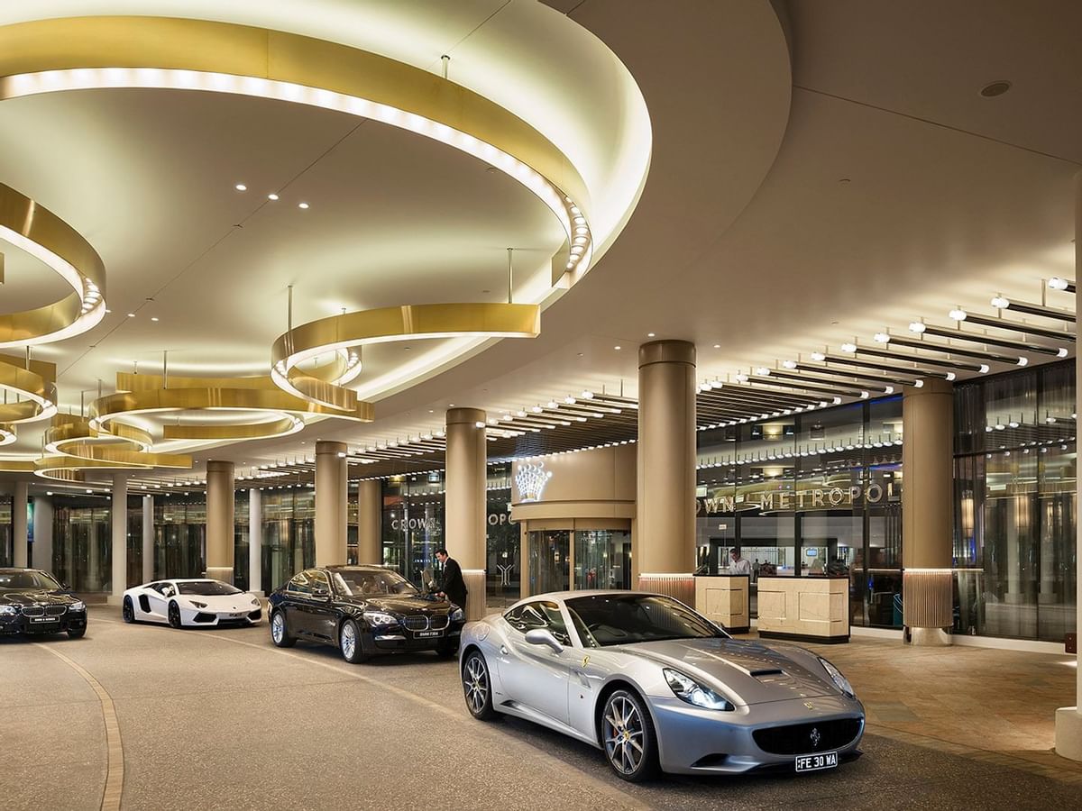 Four cars parked at the entrance of Crown Metropol Perth