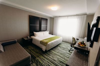 Bed & a wall-mounted work desk, Superior Room, Araiza San Luis