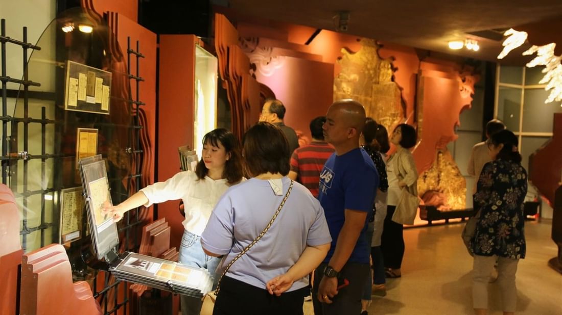People looking at exhibits in Ho Chi Minh Museum near Sunway Hotel Hanoi
