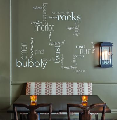 Wall with writings in 21 Lake Restaurant at Ethan Allen Hotel