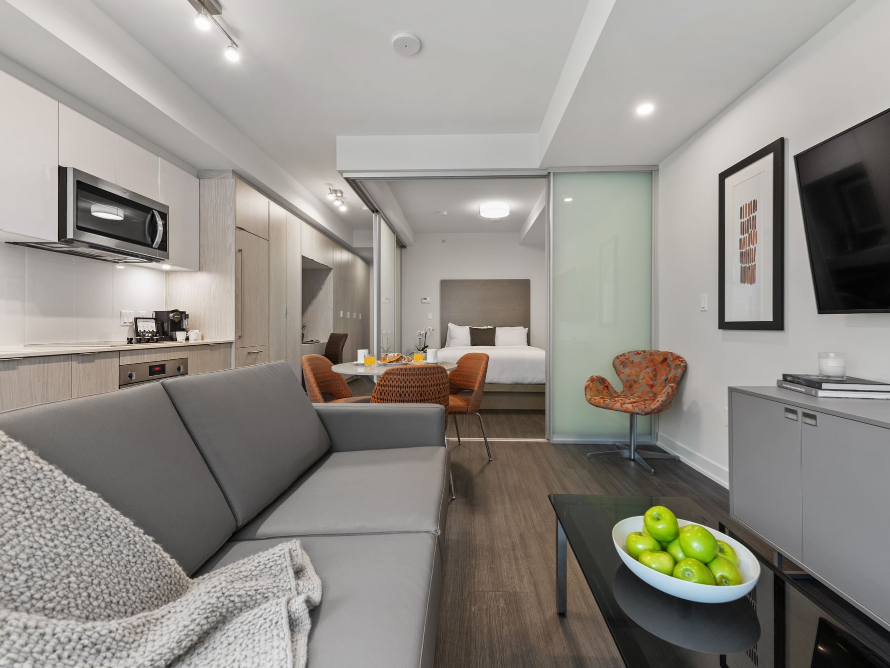 Kitchen & living area in one bedroom suite at ReStays Ottawa