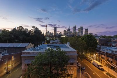 Aerial view of the city at evening from Nesuto Hotels