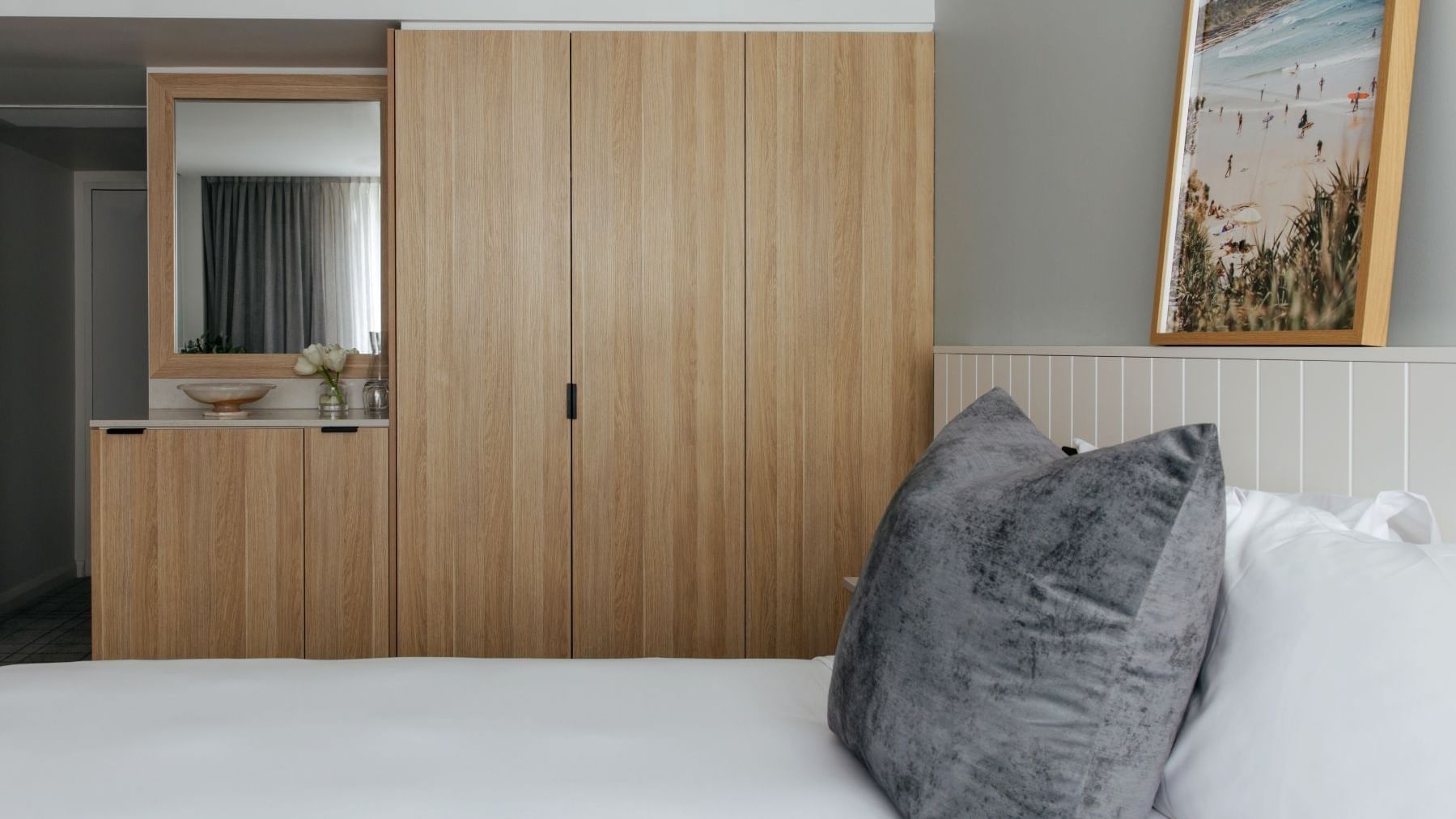 Village Balcony Queen at Elysium Manly with a wooden wardrobe by a mirrored dresser, best places to stay in Manly