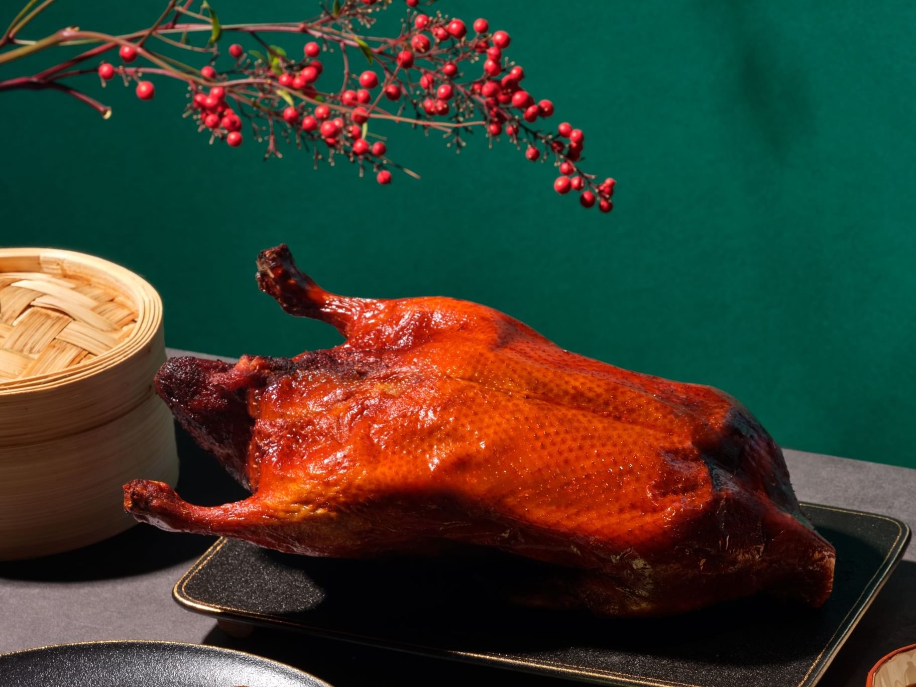 A roasted duck served on a tray in Wah Lok Cantonese Restaurant at Carlton Hotel Singapore