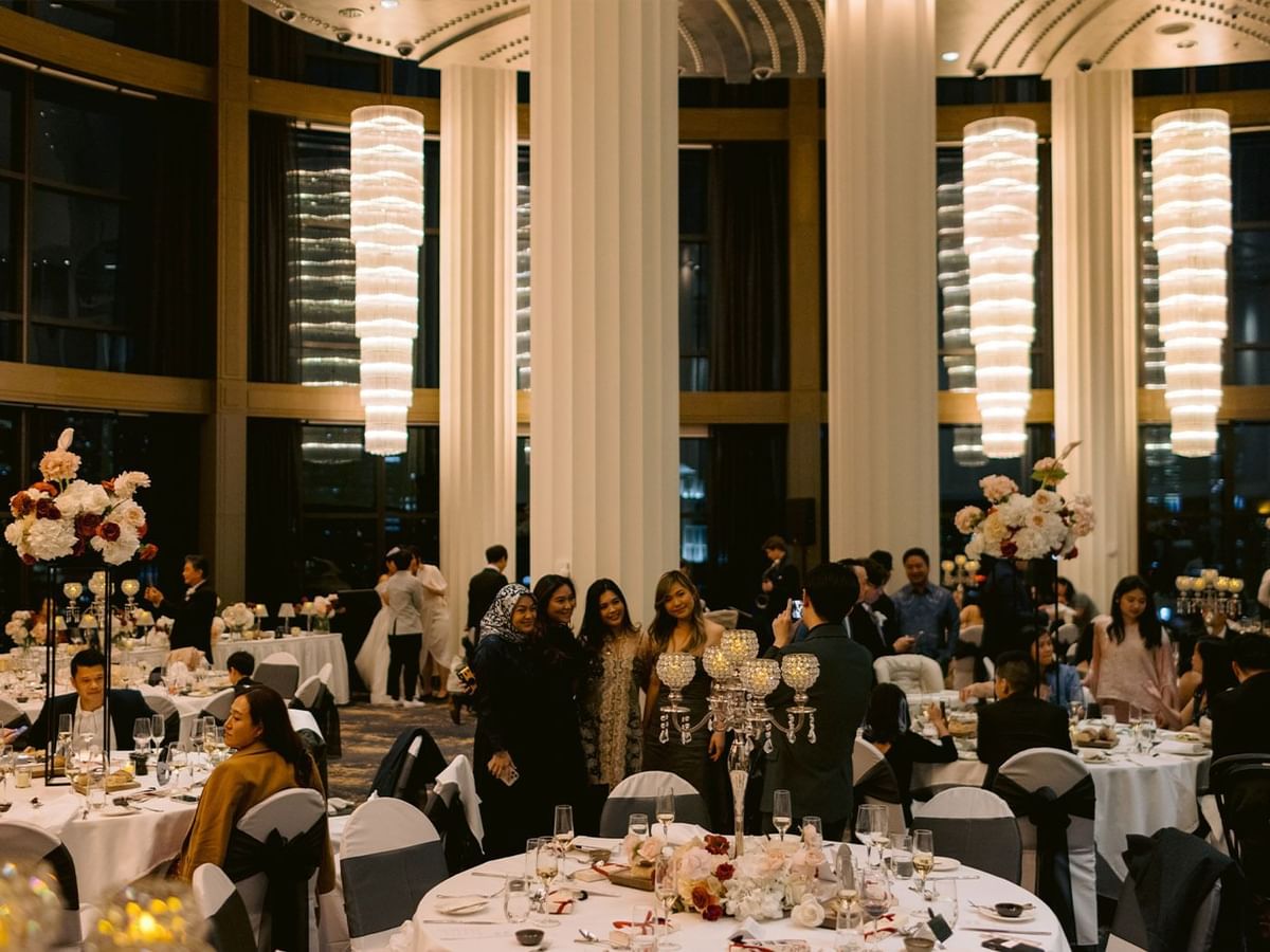 Banquet hall arranged with floral decor for Felicia and Jonathan's wedding at Crown Towers Perth
