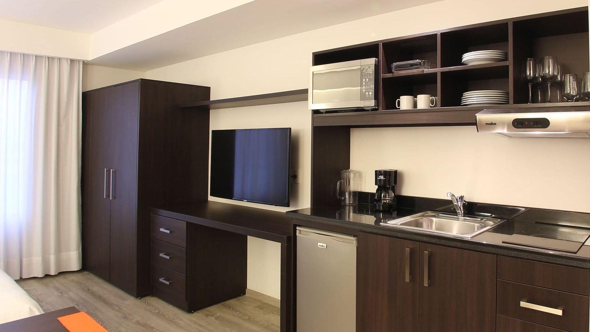 Kitchenette area in Loft Room at Fiesta Inn Querétaro