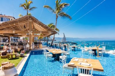 Outdoor dining area at Playa Los Arcos
