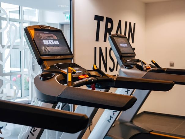 Treadmills in a fitness center at Hotel Berlin Berlin